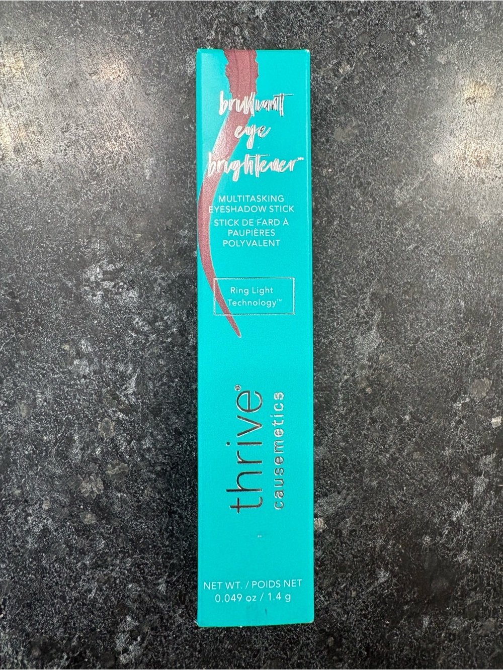 thrive causemetics Eyeshadow Stick in Teal Box with Mauve Pink Swatch